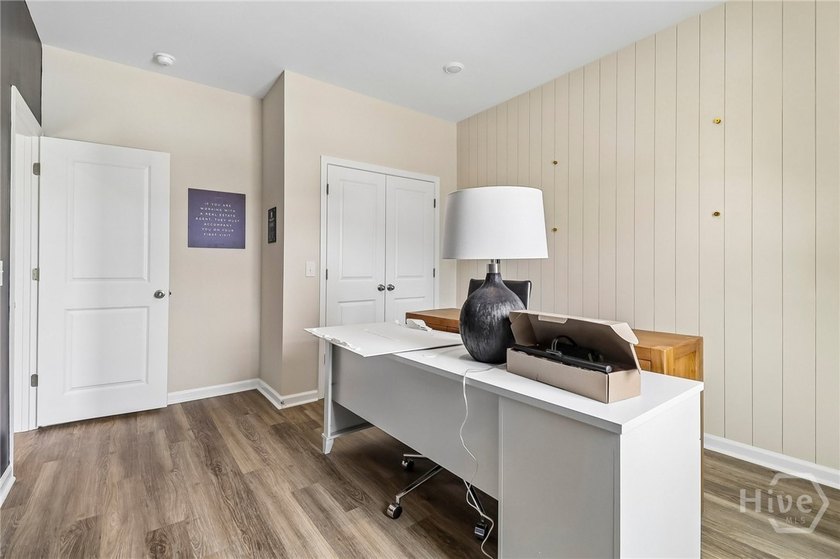 Welcome home to 22 Hidden pointe Drive! This three-story - photo 9