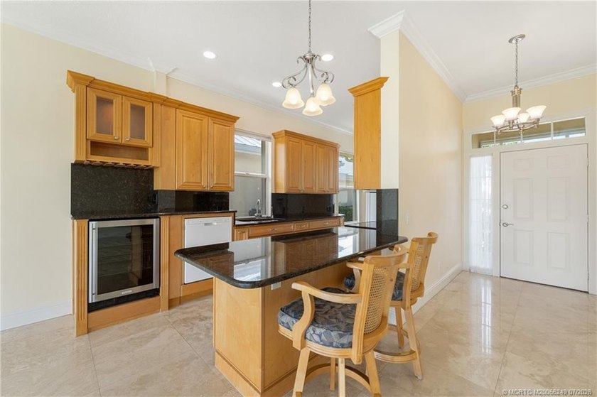 Located in the guard-gated community of The Meadows in Palm City - photo 6