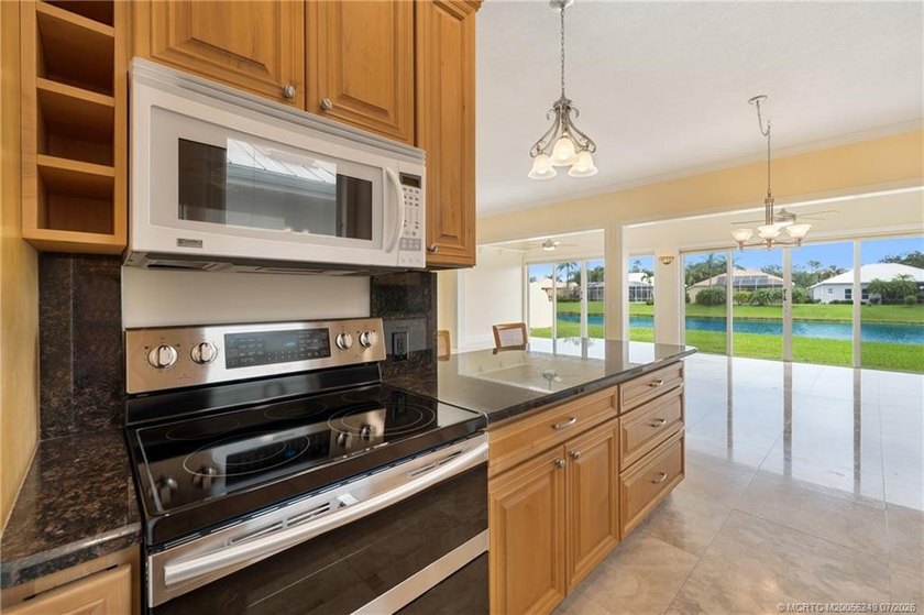Located in the guard-gated community of The Meadows in Palm City - photo 10