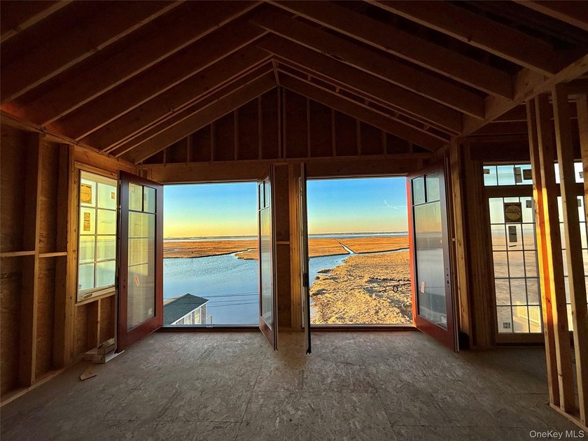 Welcome to 2 Cottage Walk in Gilgo Beach. Scheduled for - photo 5
