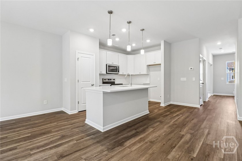 ON THE MARSH! This 3-bed, 3-bath townhouse offers 1,668 SF of - photo 3