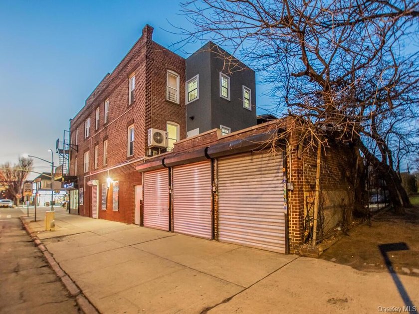 Detached brick mixed-use building with R6 zoning located on busy - photo 9