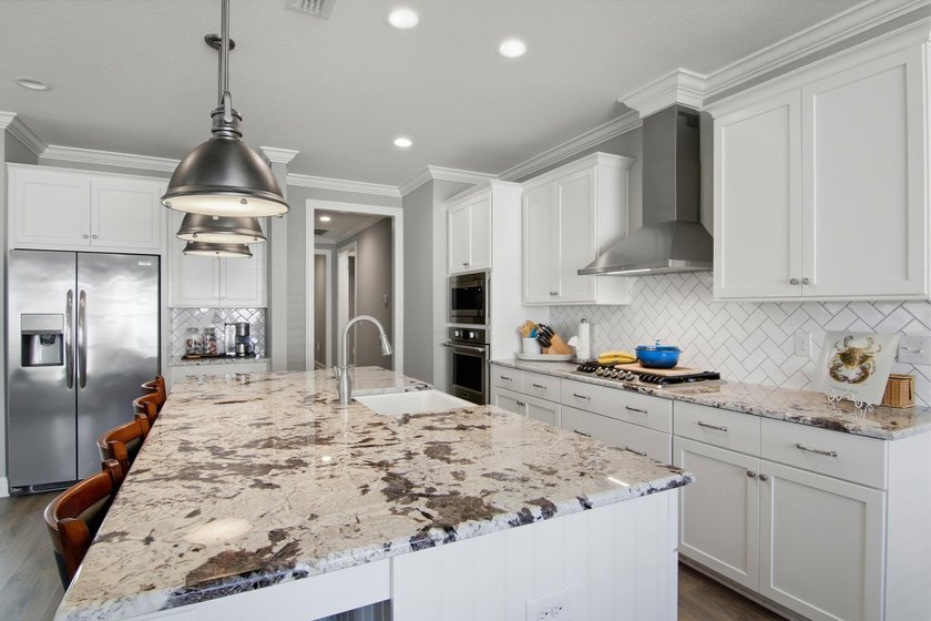 Welcome to this beautifully maintained home in the highly - photo 18