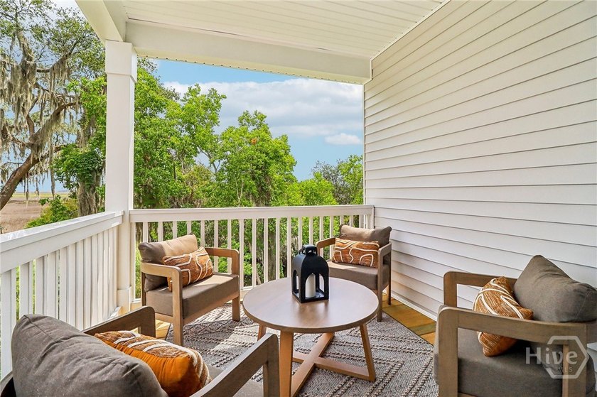 ON THE MARSH! This beautiful 4-bedroom, 3-bath townhome right on - photo 2