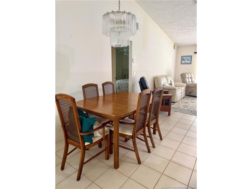 Fabulous 3/2/2 family pool home on an oversized lot. It has an - photo 6