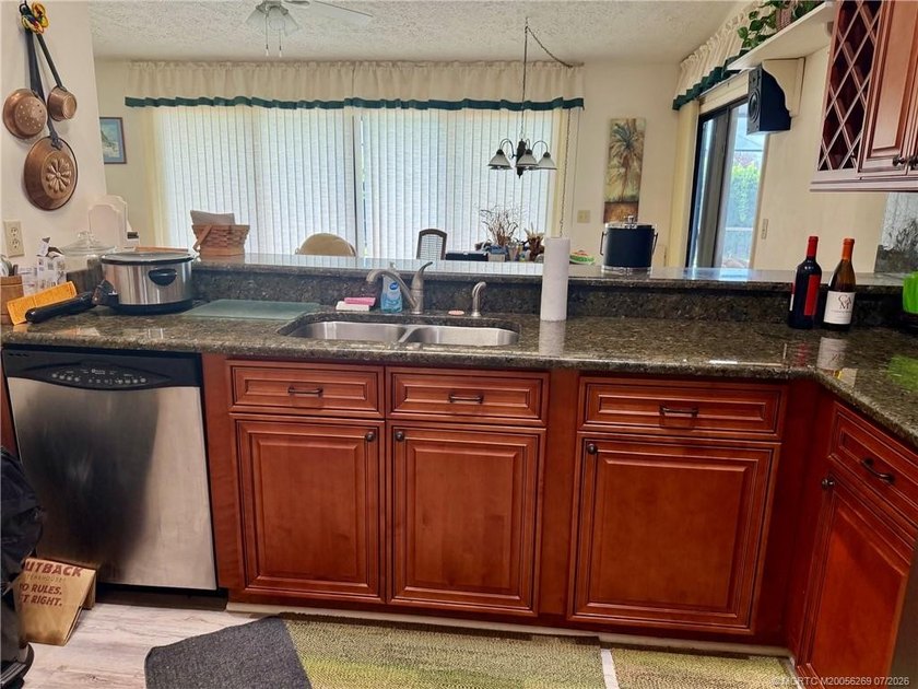 Fabulous 3/2/2 family pool home on an oversized lot. It has an - photo 8