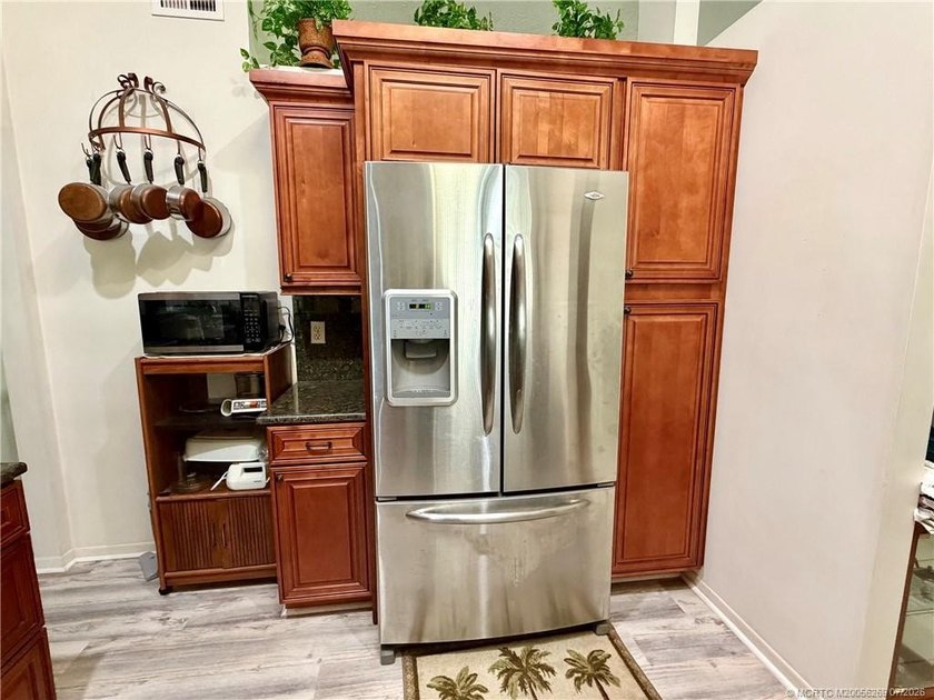 Fabulous 3/2/2 family pool home on an oversized lot. It has an - photo 9
