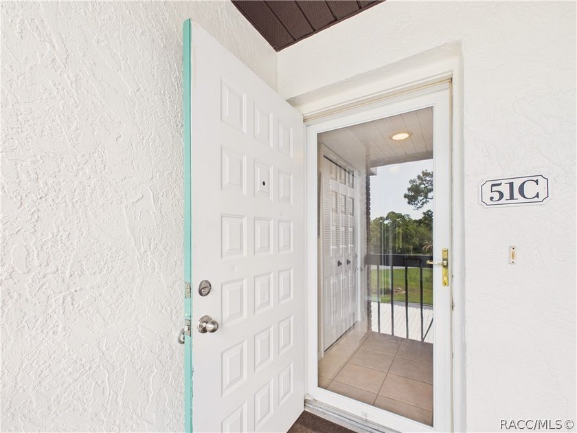 TURN-KEY &amp; FULLY FURNISHED! Start your mornings on the screened - photo 4