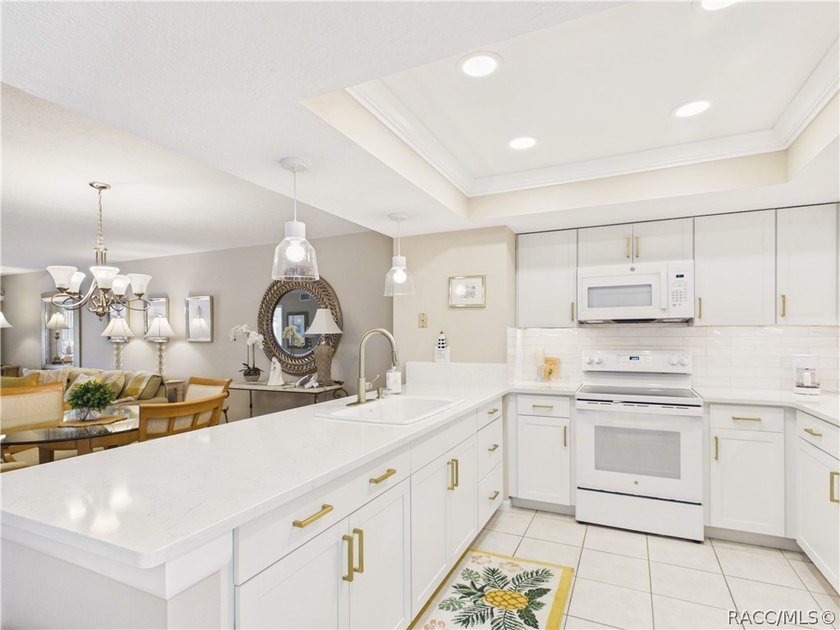 TURN-KEY &amp; FULLY FURNISHED! Start your mornings on the screened - photo 7