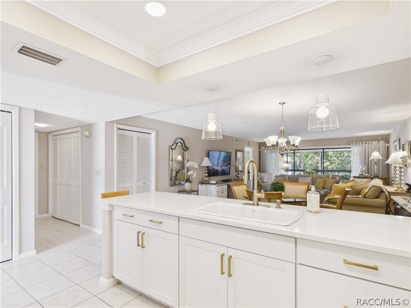 TURN-KEY &amp; FULLY FURNISHED! Start your mornings on the screened - photo 9