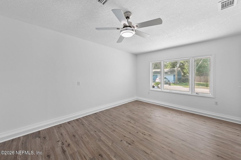 No-HOA 4-bedroom, 2-bath home in the Sans Pareil neighborhood of - photo 5