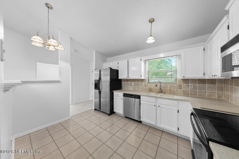 No-HOA 4-bedroom, 2-bath home in the Sans Pareil neighborhood of - photo 8
