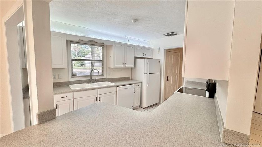 Welcome to this charming waterfront residence in Village Oaks - photo 9