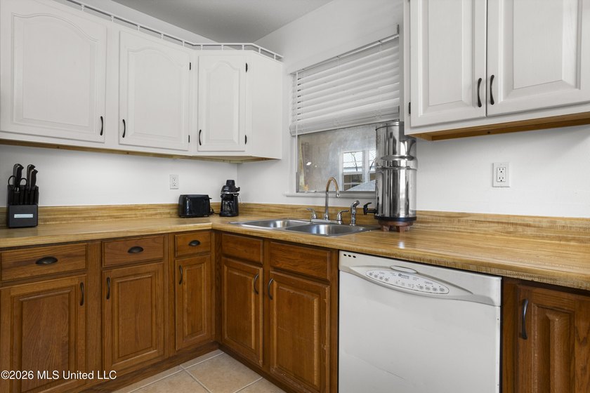 Great home with all new roof, water heater, and a/c. Well - photo 12