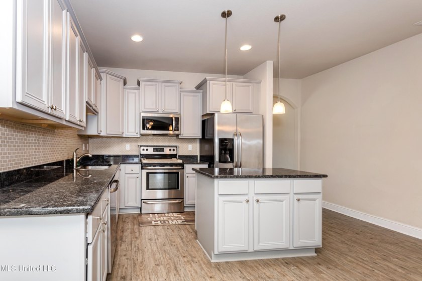 Welcome home to this charming 3-bedroom, 2-bath home in one of - photo 15