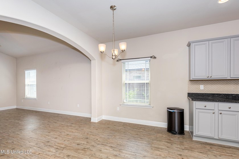 Welcome home to this charming 3-bedroom, 2-bath home in one of - photo 18