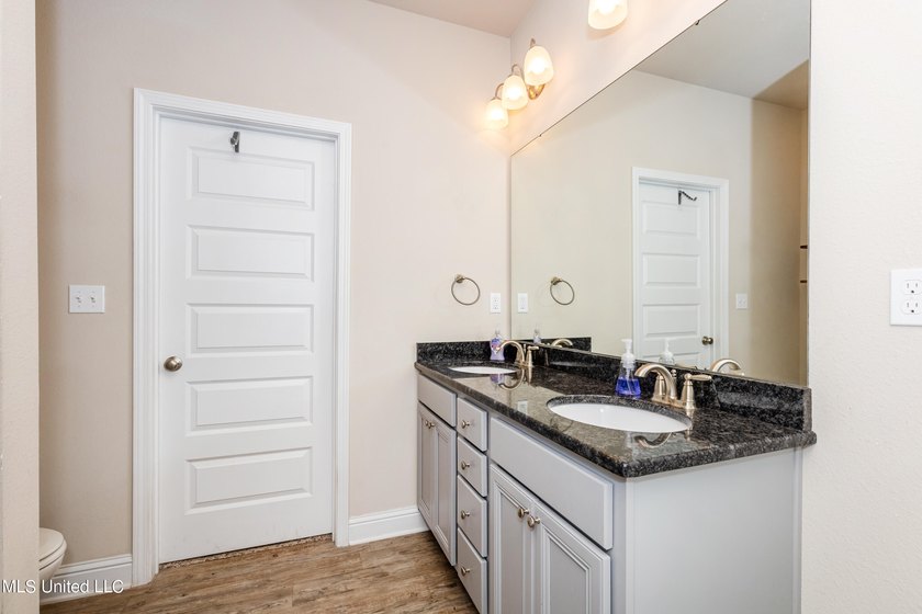 Welcome home to this charming 3-bedroom, 2-bath home in one of - photo 22