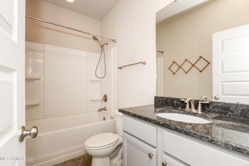 Welcome home to this charming 3-bedroom, 2-bath home in one of - photo 30