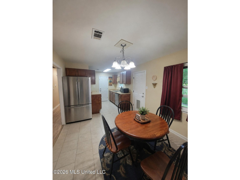 Welcome to this 3-bedroom, 1.5-bath home in Biloxi. Conveniently - photo 4