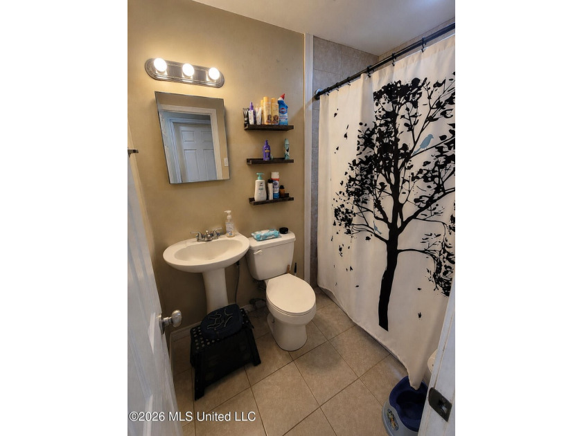 Welcome to this 3-bedroom, 1.5-bath home in Biloxi. Conveniently - photo 6