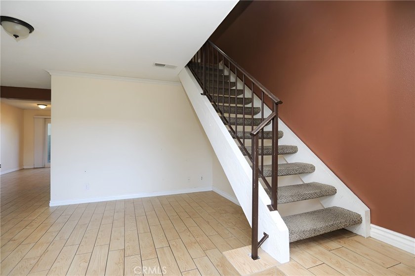Welcome to Midtown Village! This 3-bedroom, 1.5-bath PUD offers - photo 2