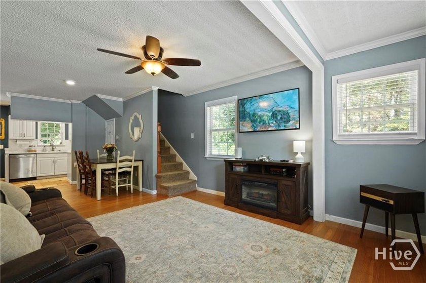 Nestled on nearly half an acre just moments from the heart of - photo 4