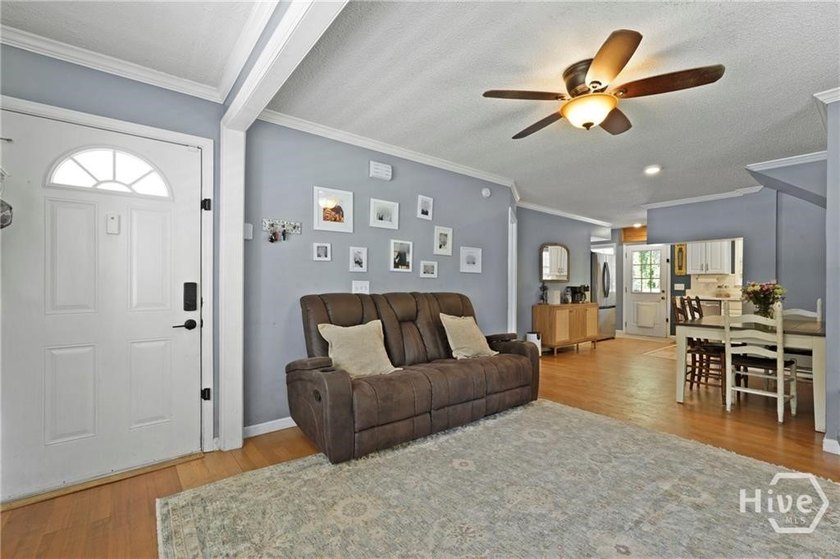 Nestled on nearly half an acre just moments from the heart of - photo 8