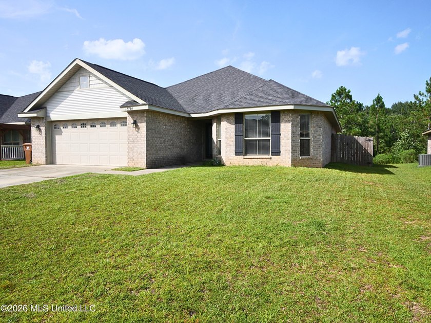 This beautifully maintained all-brick home, built just six years - photo 3