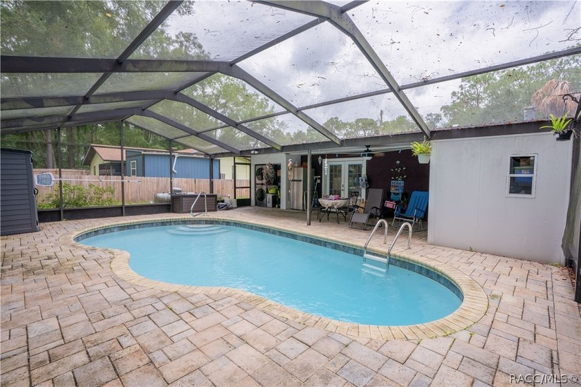 Beautifully maintained 4-bedroom, 2-bath pool home in the - photo 2