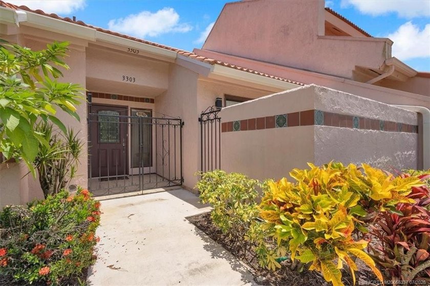 Located in gated community of Sandpiper Bay, this furnished - photo 2