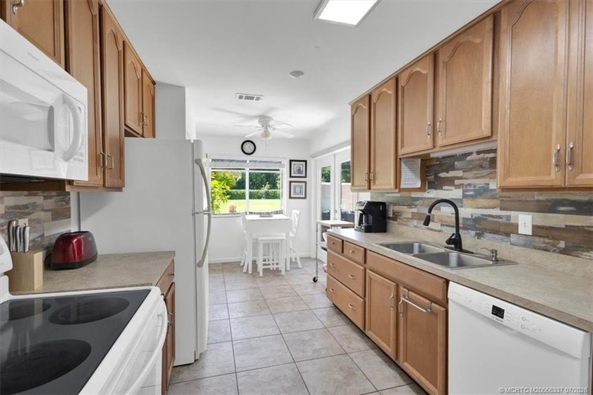 Located in gated community of Sandpiper Bay, this furnished - photo 4