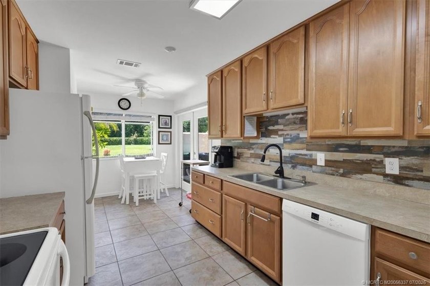 Located in gated community of Sandpiper Bay, this furnished - photo 5