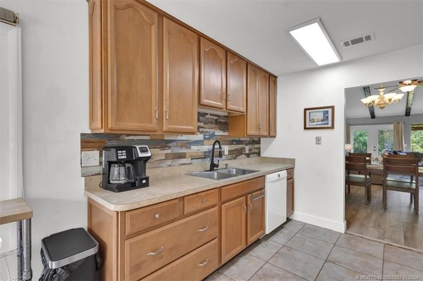 Located in gated community of Sandpiper Bay, this furnished - photo 7