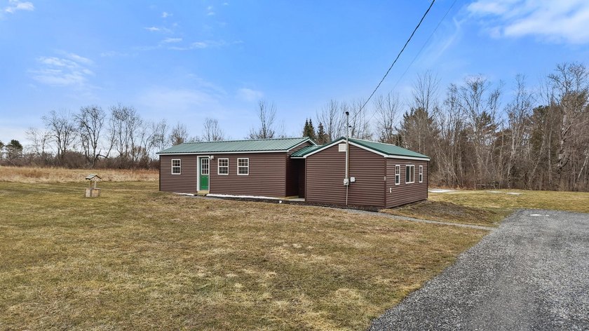 Set in a picturesque country setting with sweeping views of - photo 2