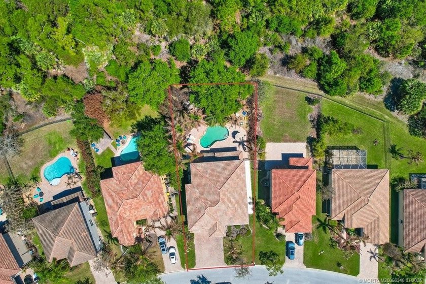 Tropical oasis within one of Palm City FL premier gated - photo 4