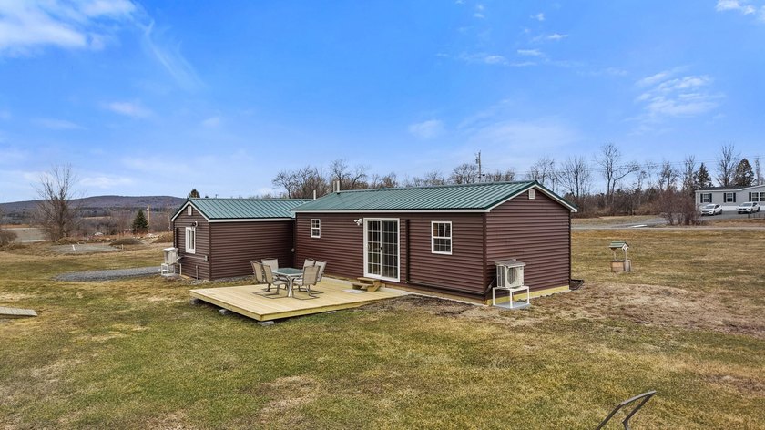 Set in a picturesque country setting with sweeping views of - photo 5