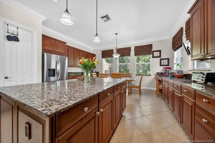 Tropical oasis within one of Palm City FL premier gated - photo 10