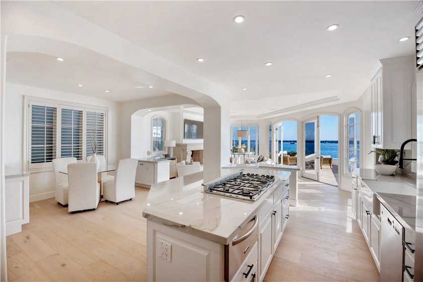 Overlooking the channel entrance, this waterfront home is - photo 5