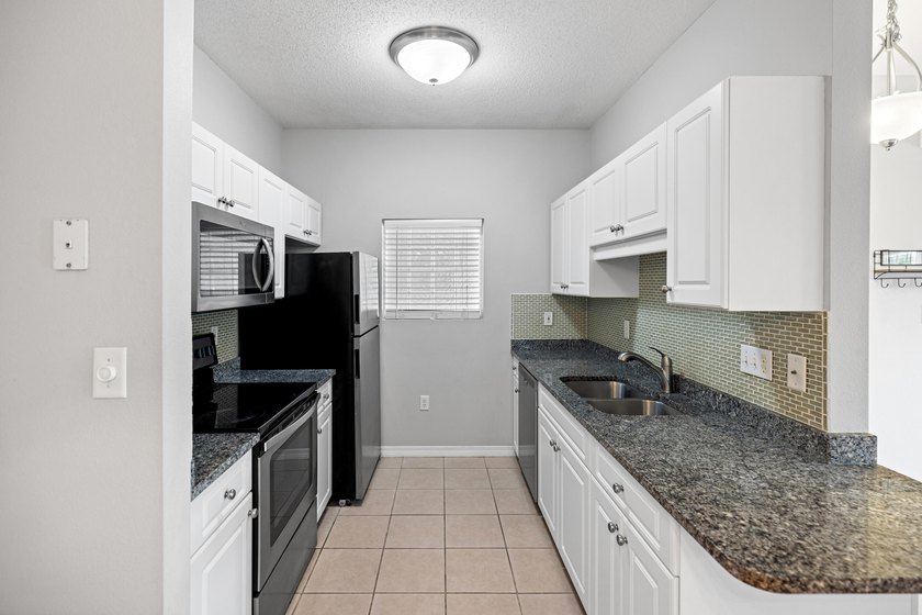 Affordable and move in ready! Charming 2-bedroom, 2-bath condo - photo 16