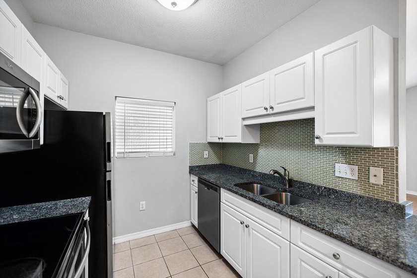 Affordable and move in ready! Charming 2-bedroom, 2-bath condo - photo 20