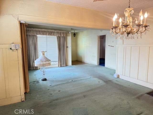 Walk into a open space living room with plenty of natural light - photo 7