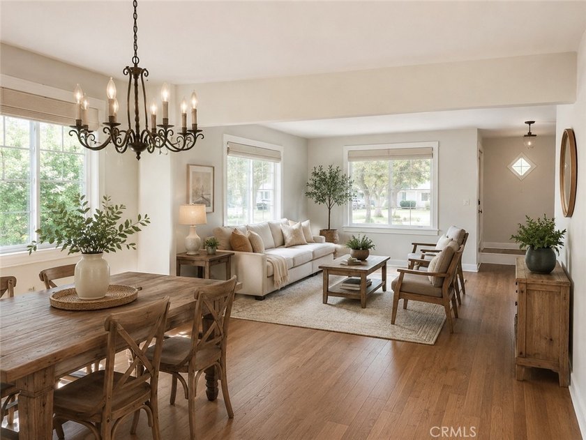 Walk into a open space living room with plenty of natural light - photo 8
