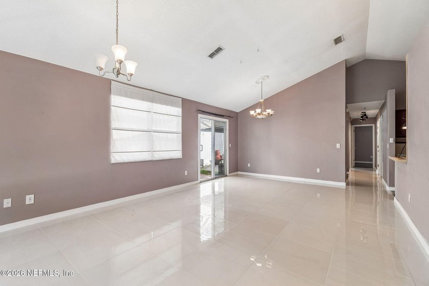 Just minutes from NAS Jacksonville, this private detached home - photo 3