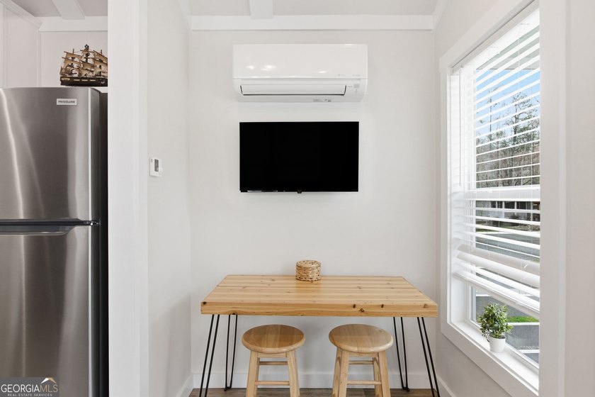 Simple living meets modern comfort in this Wayah model tiny home - photo 12