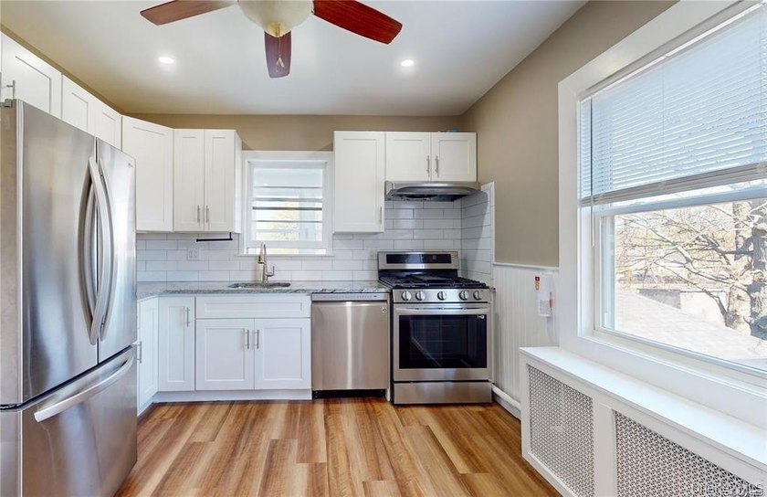 Beautiful Legal Two-Family Home, Also Works Seamlessly As A - photo 19