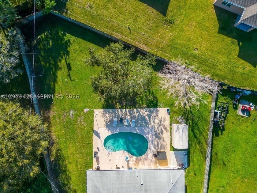 Your peaceful Port St. Lucie retreat. This 3-bedroom, 2-bath - photo 4