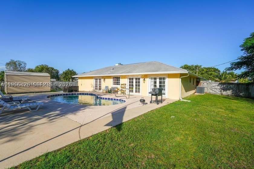 Your peaceful Port St. Lucie retreat. This 3-bedroom, 2-bath - photo 7