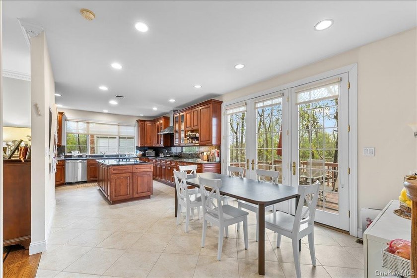 This young Center Hall Brick Colonial offers a spacious and - photo 15