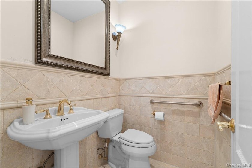 This young Center Hall Brick Colonial offers a spacious and - photo 22