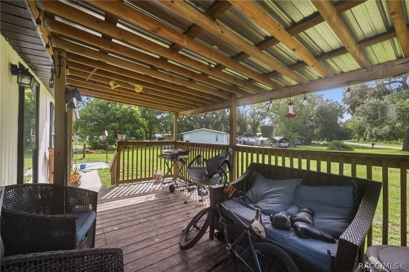 Located on a 0.19-acre corner lot in Floral City, this - photo 4